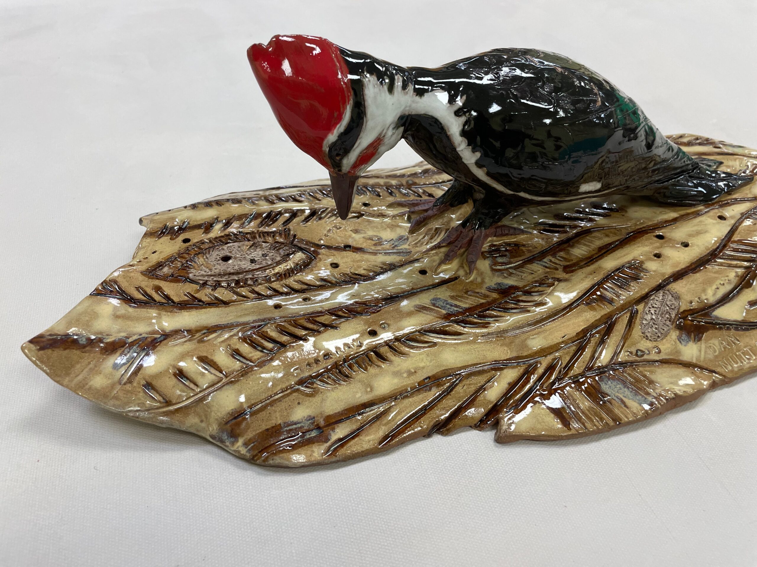 pileated woodpecker ceramic sculpture